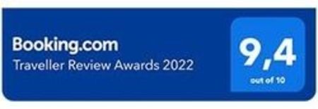 Booking.com Traveller Review Award 2022 für Fleger Appartements mit Bewertung 9,4 von 10.